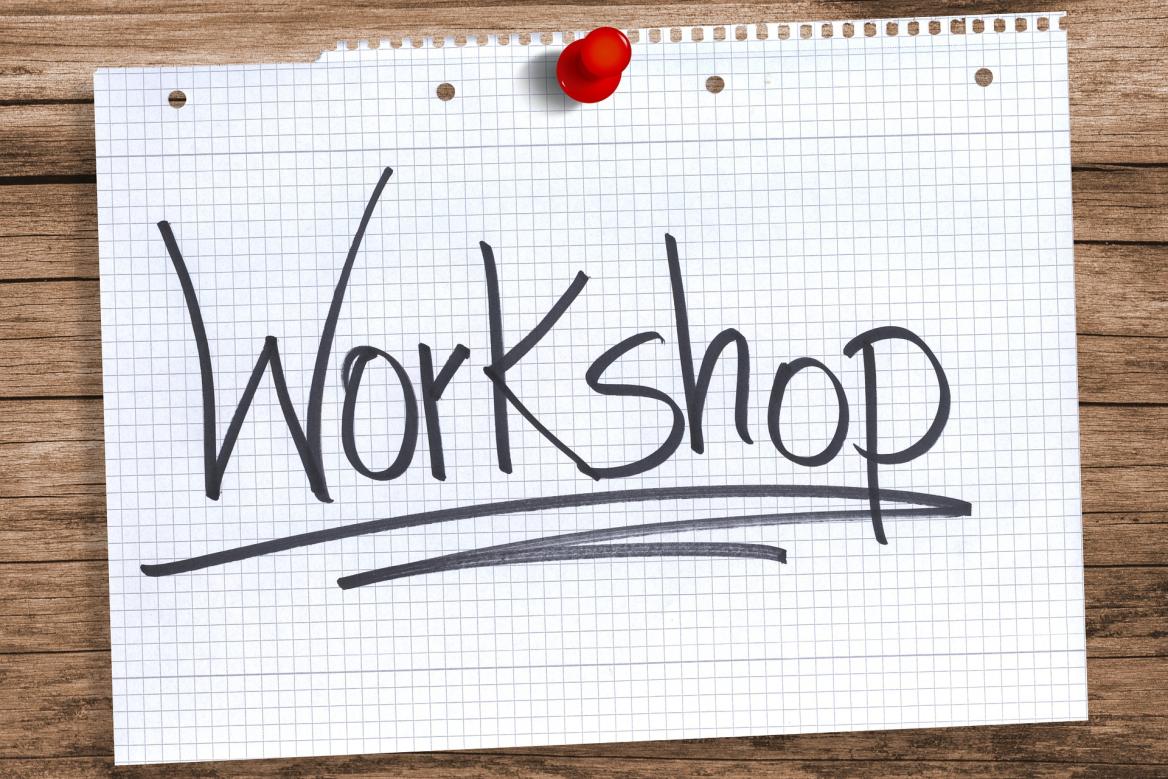 Das Bild zeigt einen Zettel mit der Aufschrift Workshop.